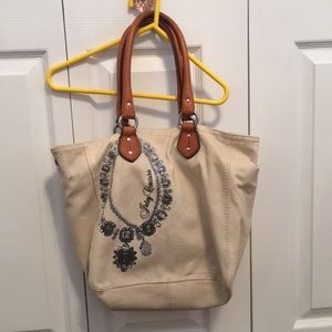 Juicy Couture tan purse